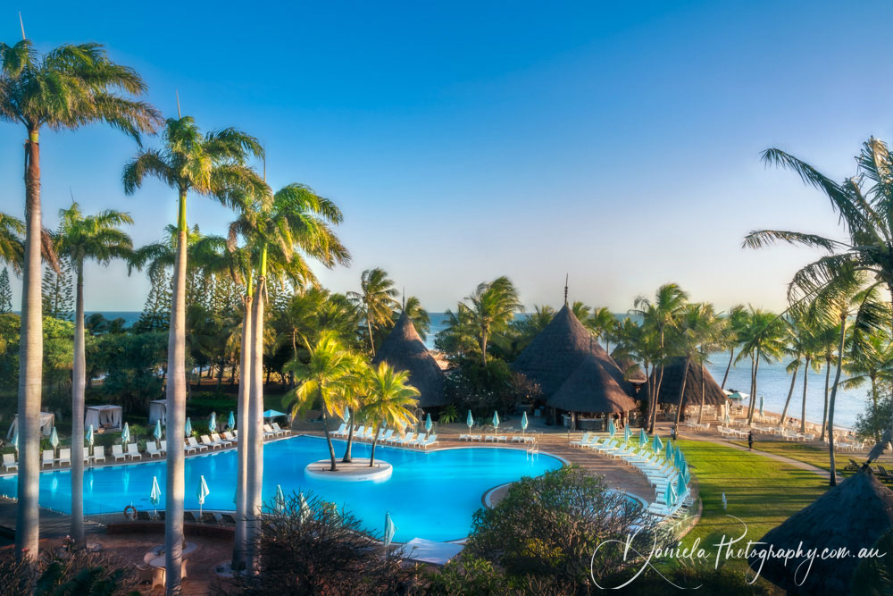 New Caledonia Tropical resort at Anse Vata Beach at sunset in Noumea